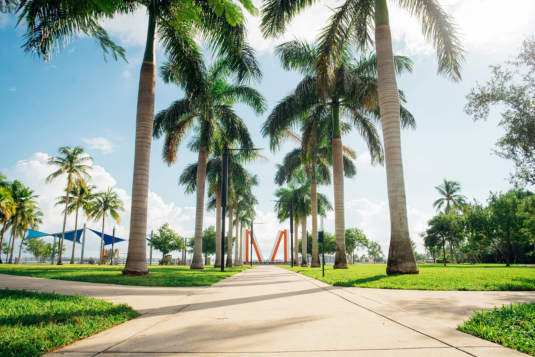 Palm-lined waterfront park near Kempinski Residences Miami Design District