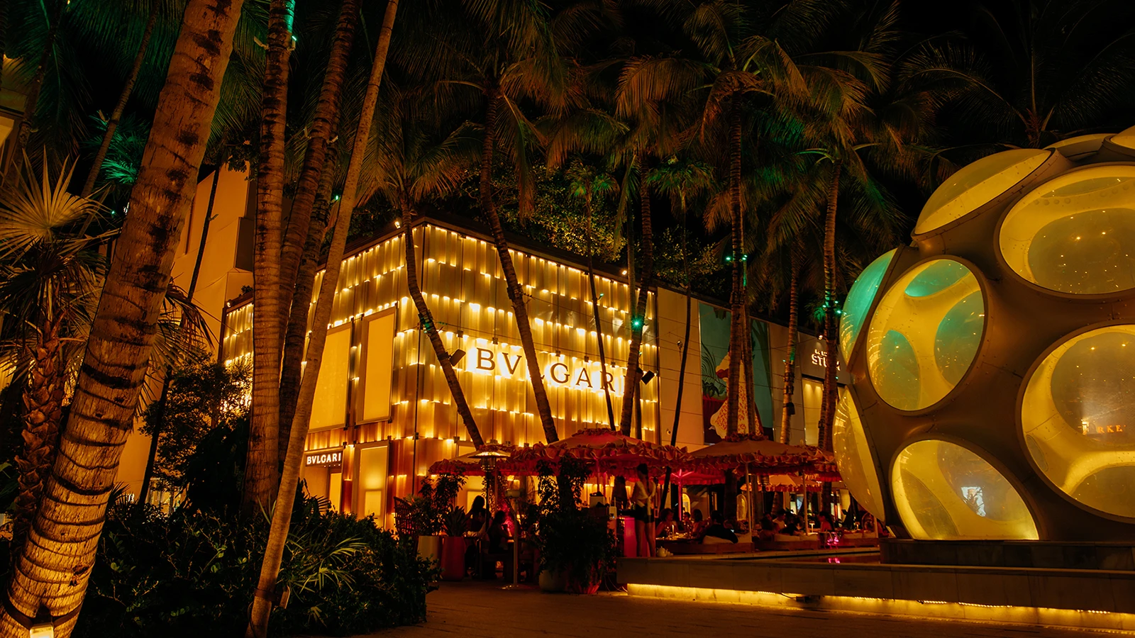 Miami Design District at night with luxury retail and public art