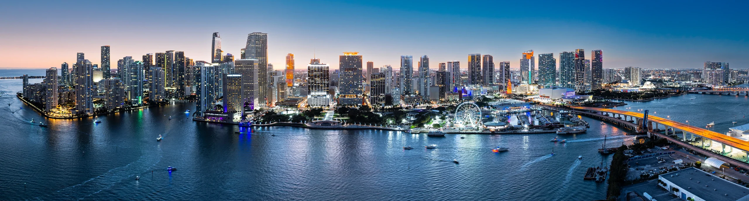 Miami skyline over Biscayne Bay at dusk near Design District
