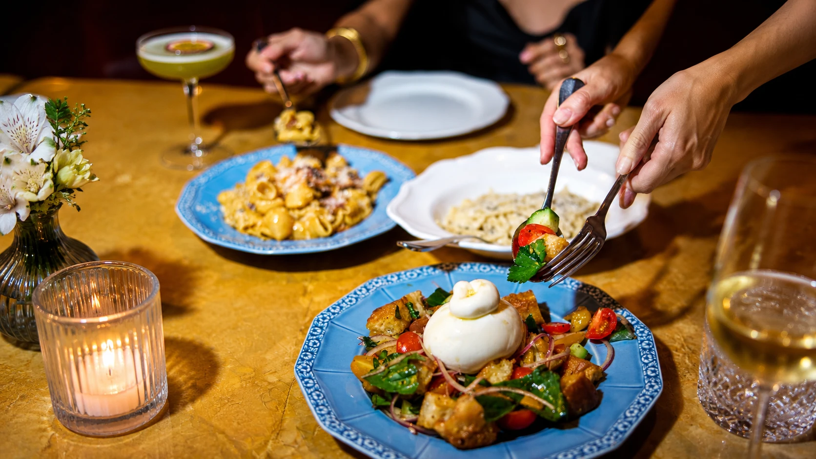 Refined Miami dining experience with elegant plates and cocktails