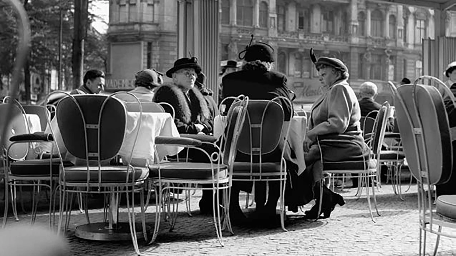 Historic Kempinski outdoor dining scene showing European café hospitality