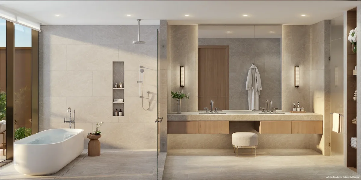 Luxury primary bathroom with soaking tub, walk-in shower, and dual vanities at Kempinski Residences Miami Design District