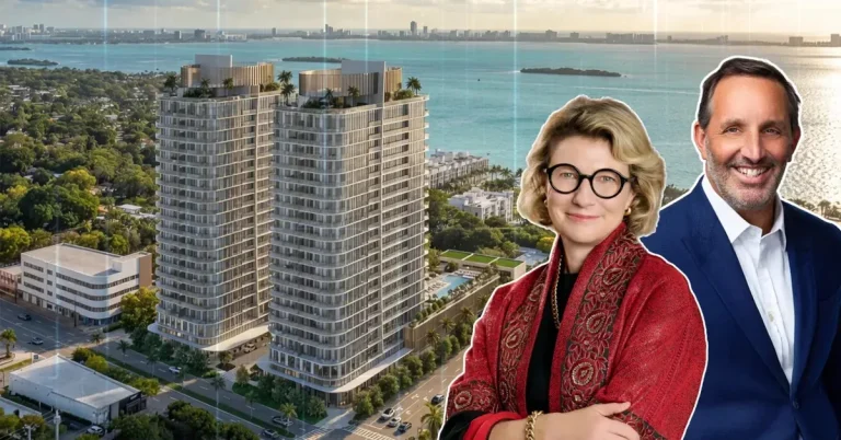 Two real estate professionals pose before a luxury Miami waterfront high-rise development with Biscayne Bay views in the background.