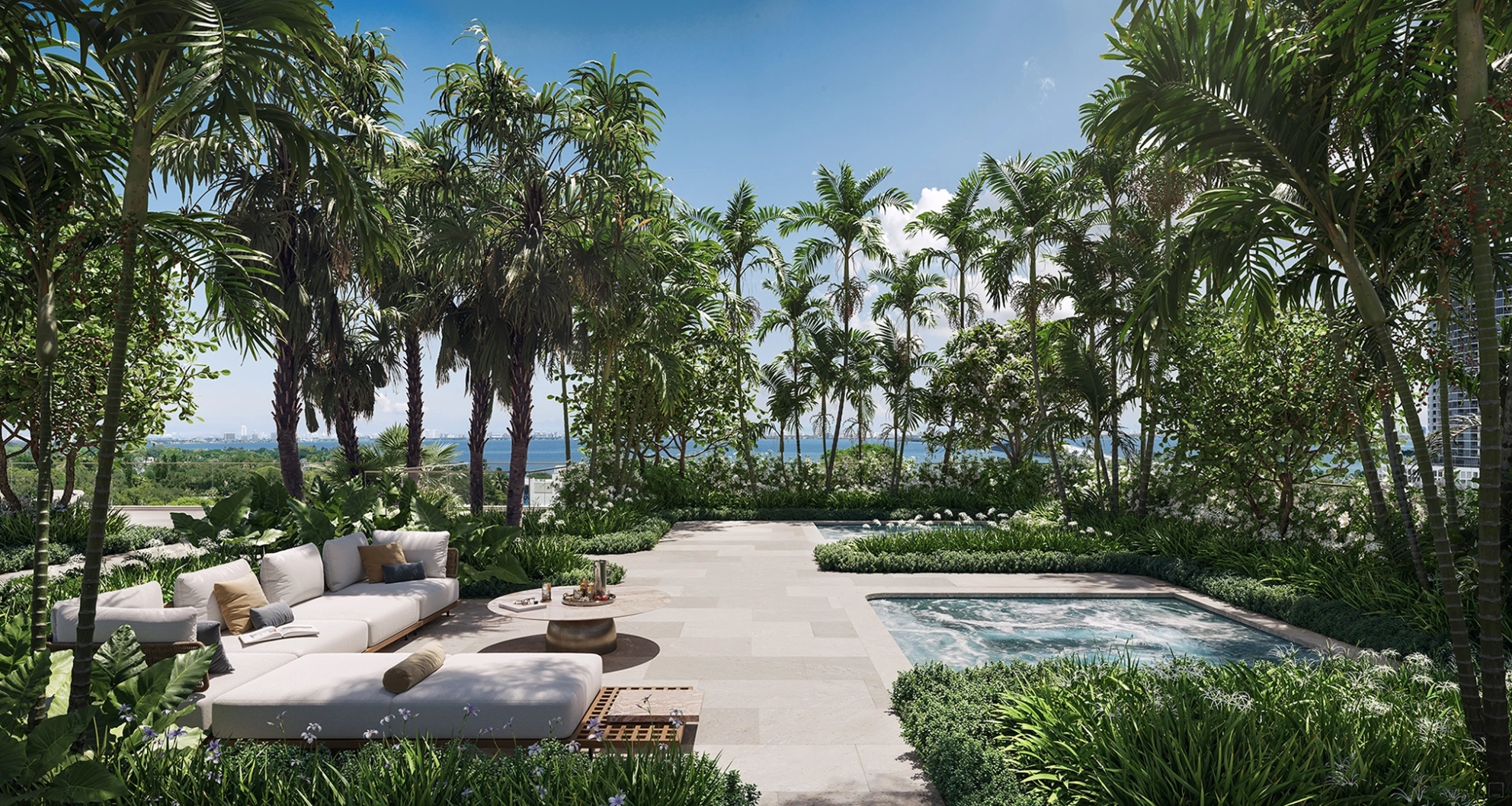 North pool area at Kempinski Residences Miami Design District with lounge seating, cabanas, tropical landscaping, and residential towers