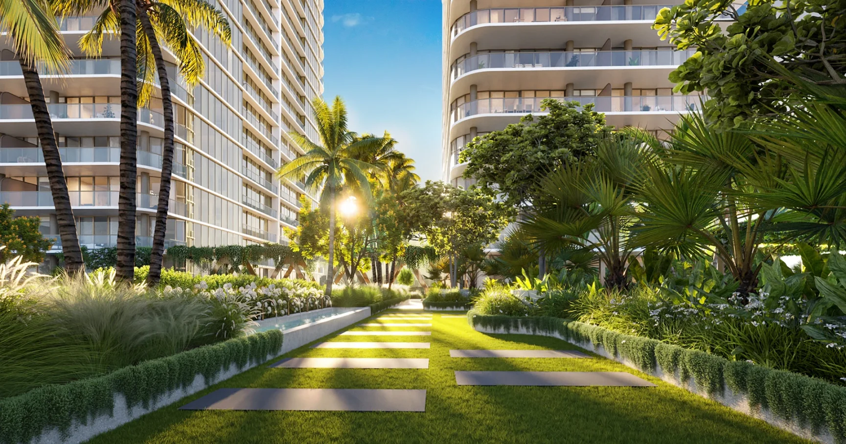 North yoga area at Kempinski Residences Miami Design District with outdoor mats, tropical landscaping, and residential towers